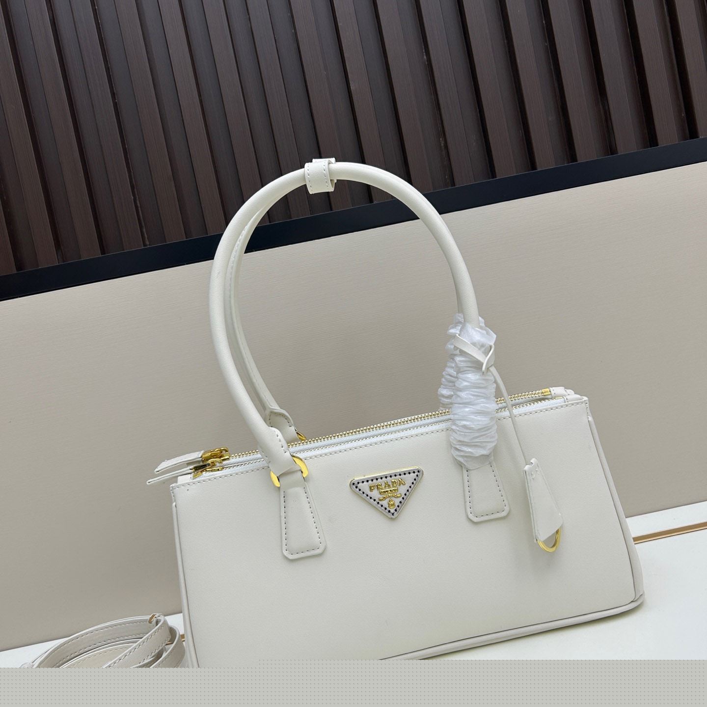 Pra*a top handle bags